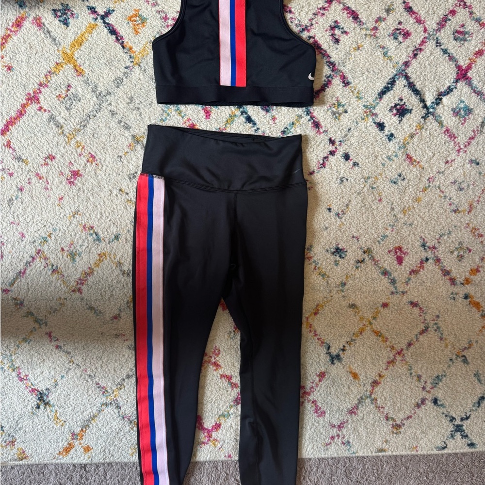 Nike- stylish black Activewear Set with Pink and Blue Stripes.